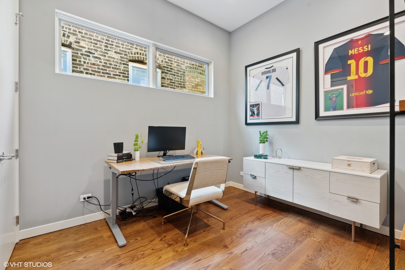 2207 West Chicago Avenue, Unit 3W Chicago, IL 60622 - Photo 9 of 15 a view of a workspace with furniture and wooden floor