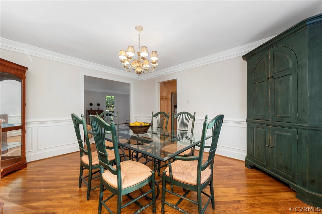 2420 Rochester Court Midlothian, VA 23113 - Photo 8 of 45 a view of a dining room with furniture and wooden floor