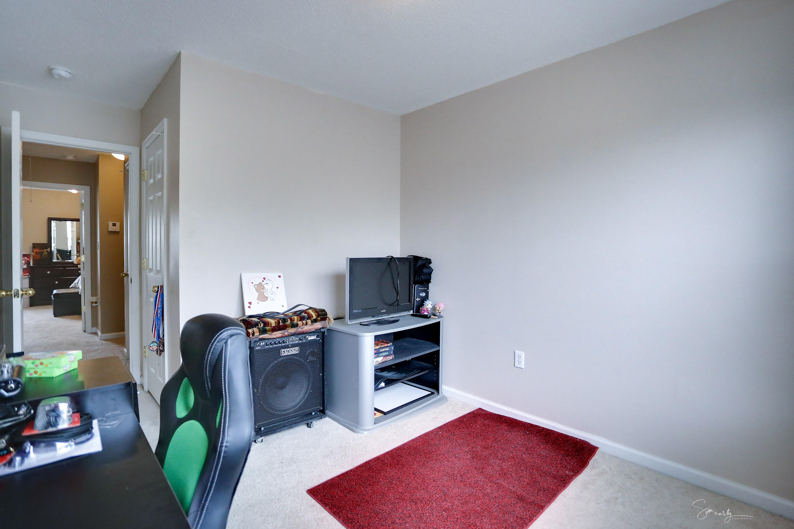 365 Crooked Pine Trail Crestview, FL 32539 - Photo 30 of 35 a room with furniture and a flat screen tv