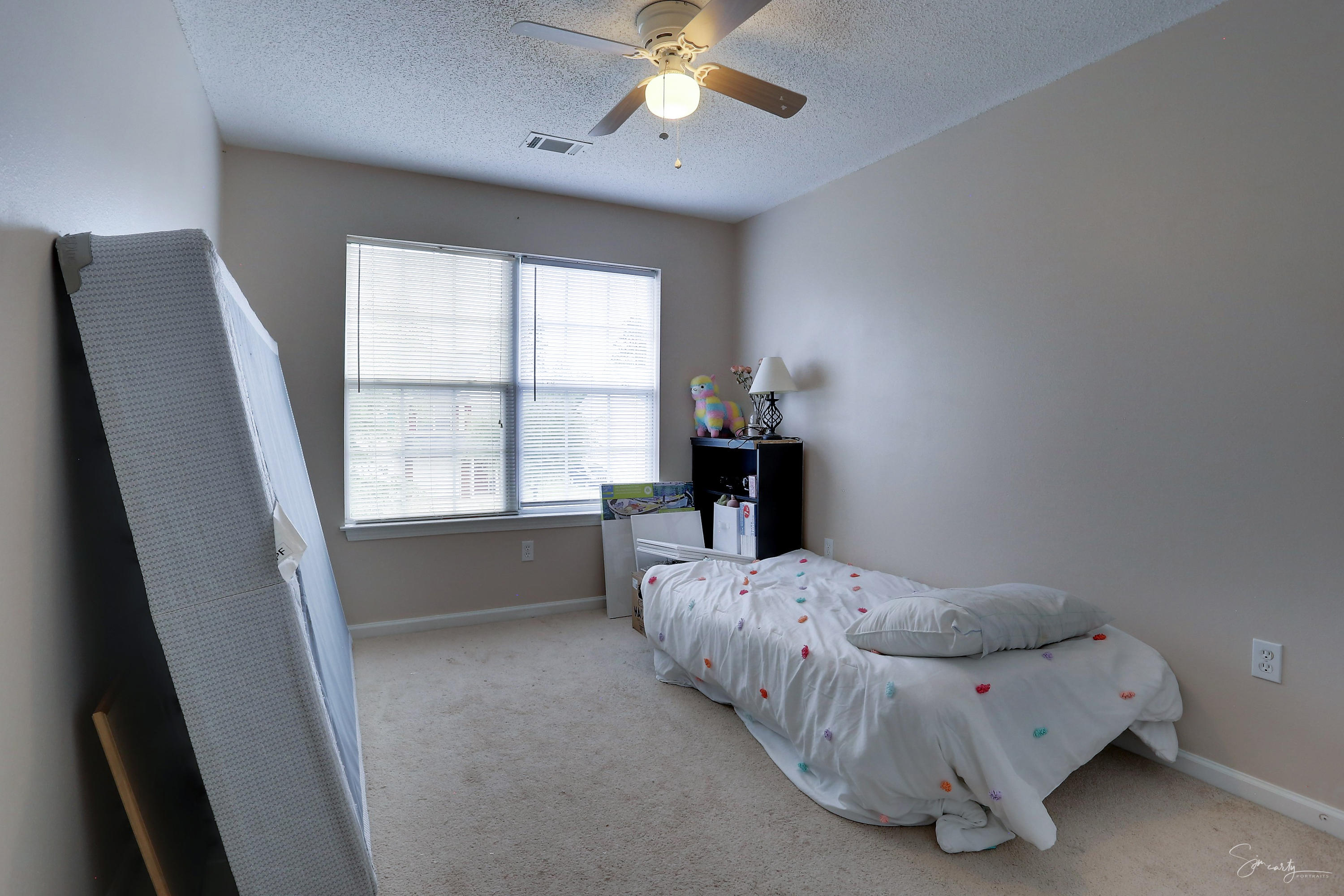 365 Crooked Pine Trail Crestview, FL 32539 - Photo 32 of 35 a bedroom with a bed and a window