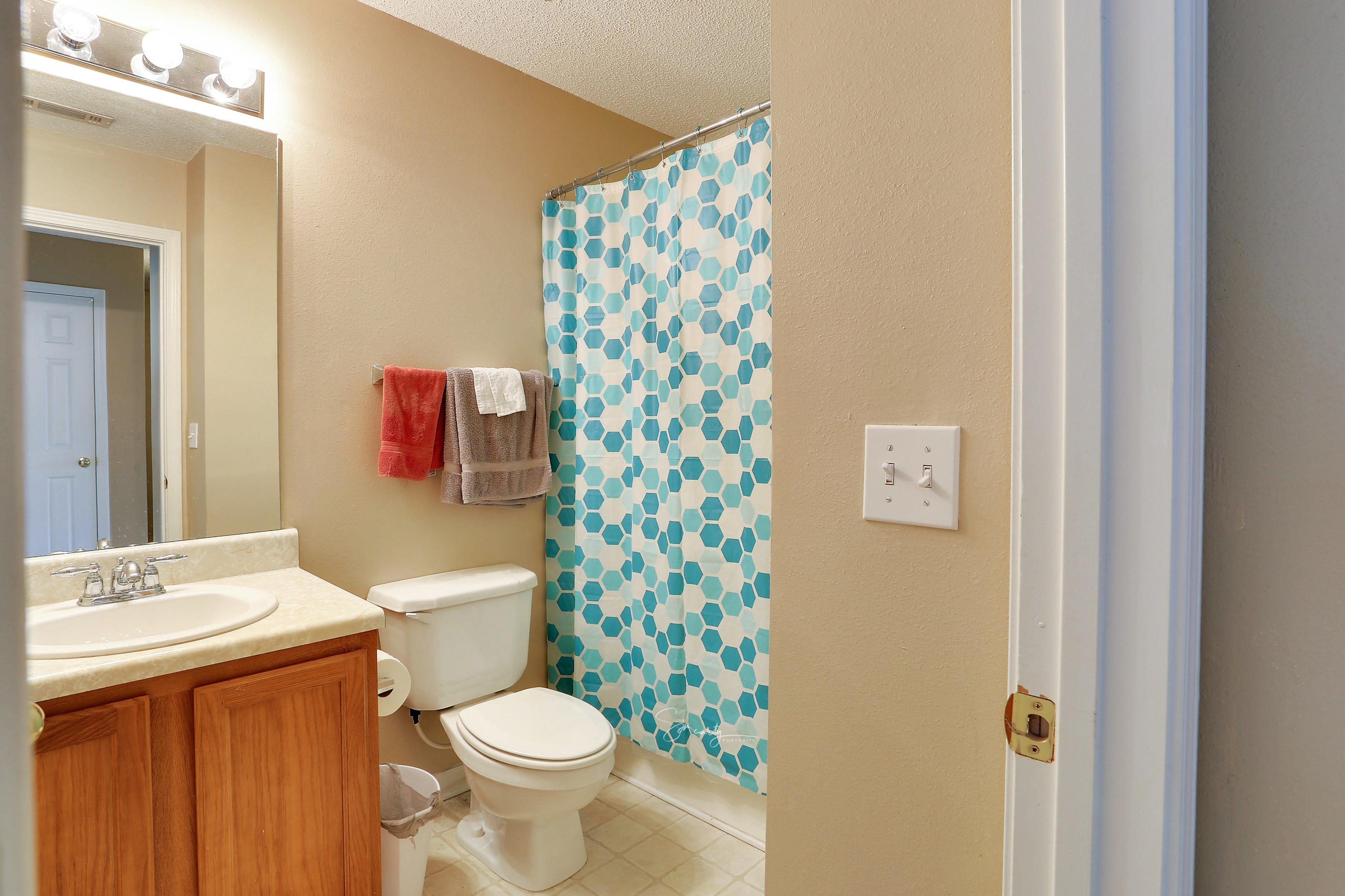 365 Crooked Pine Trail Crestview, FL 32539 - Photo 35 of 35 a white toilet sitting next to a bathroom sink