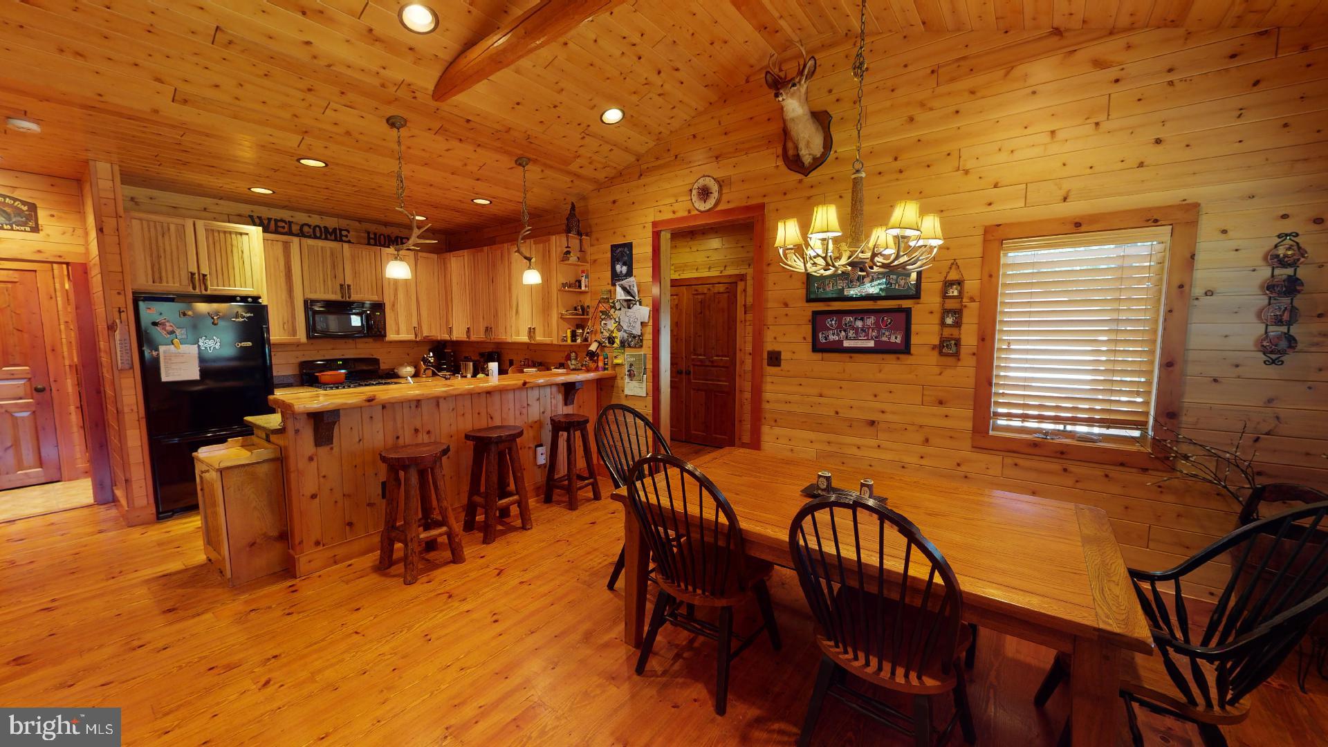 14614 Snake Castle Road Sumerduck, VA 22742 - Photo 26 of 103 dining room and kitchen