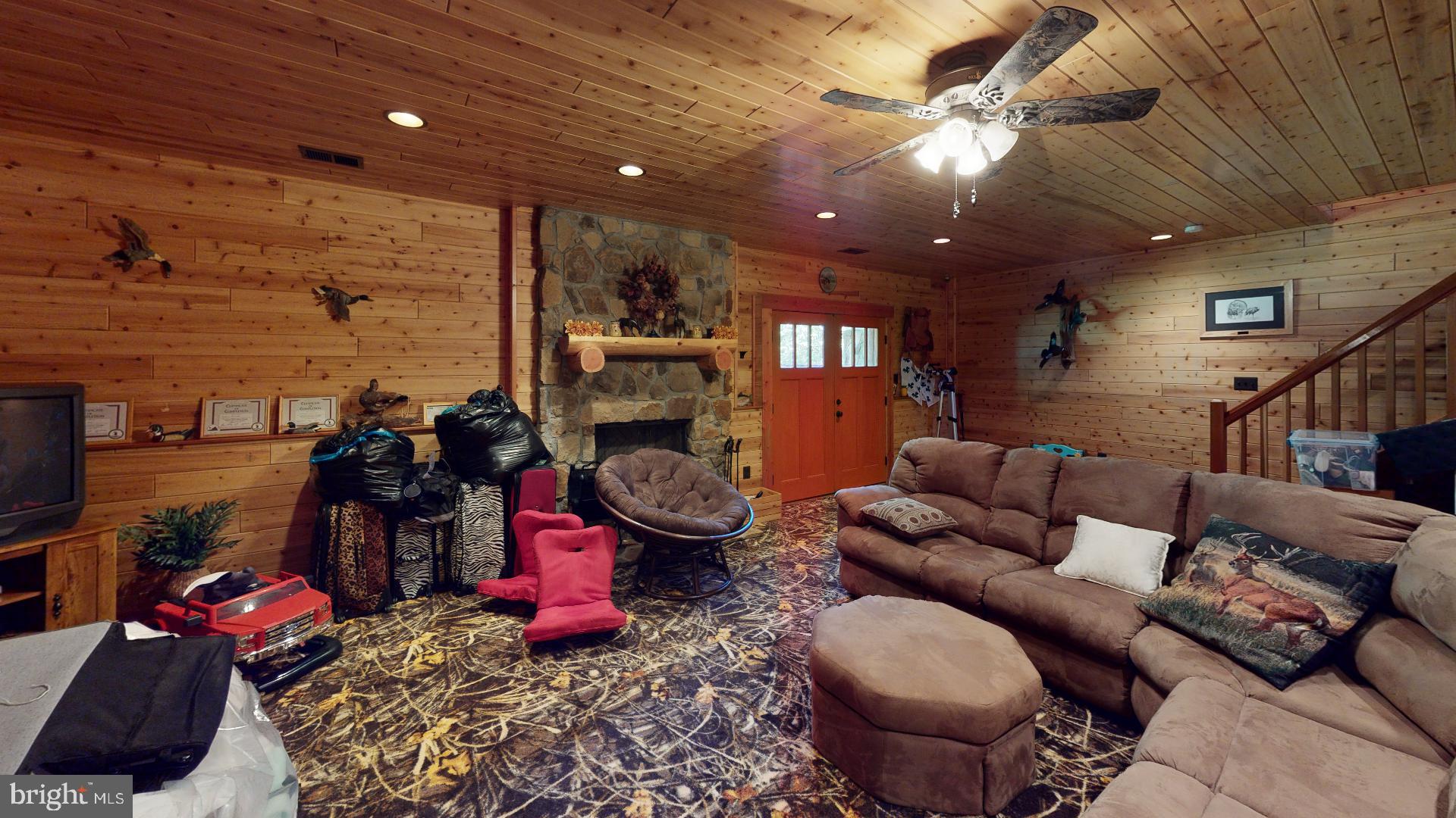 14614 Snake Castle Road Sumerduck, VA 22742 - Photo 44 of 103 Basement fireplace and family room.
