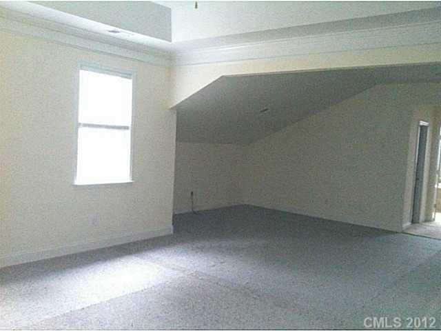7123 Nesbit Road Waxhaw, NC 28173 - Photo 12 of 16 an empty room with a window