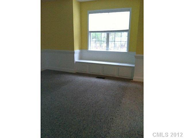 7123 Nesbit Road Waxhaw, NC 28173 - Photo 6 of 16 a room with a window and ceiling fan