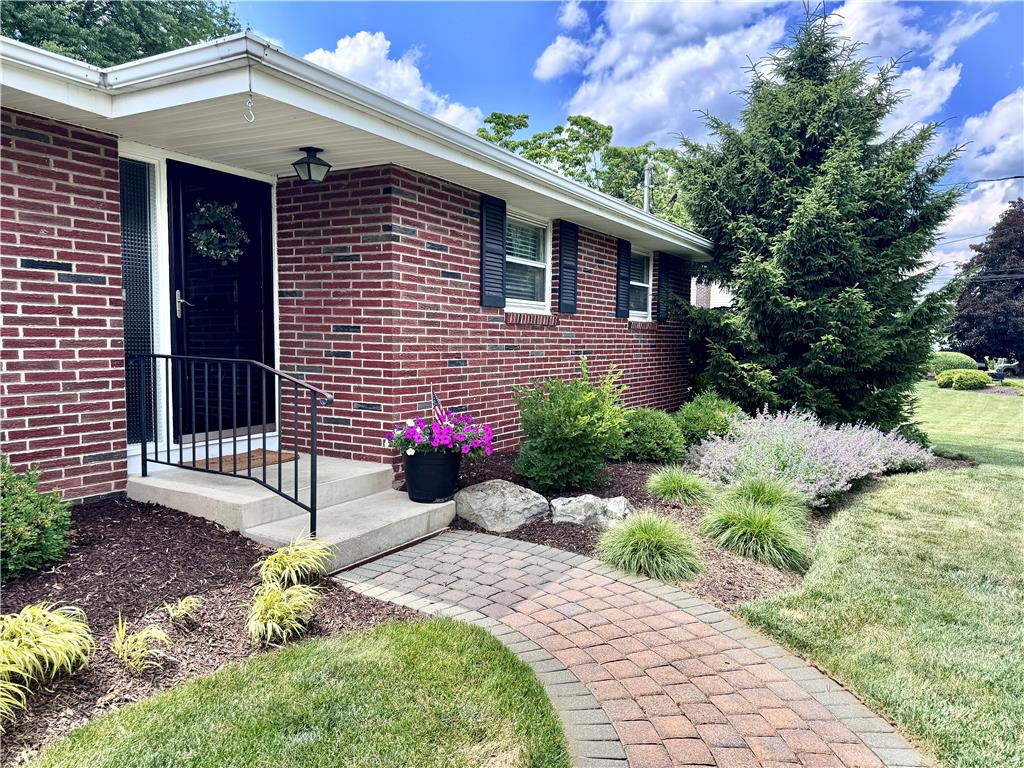 5334 Egypt Road Laurys Station, PA 18059 - Photo 5 of 55 A classic brick exterior offers appealing curb appeal with a landscaped walkway leading to the entry.