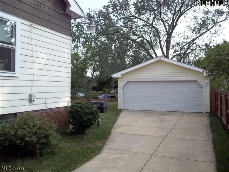 6434 Monmouth Road Parma, OH 44129 - Photo 5 of 25 Newer driveway with 2 car garage.