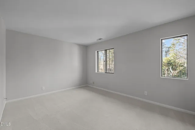 a view of a balcony with a pot