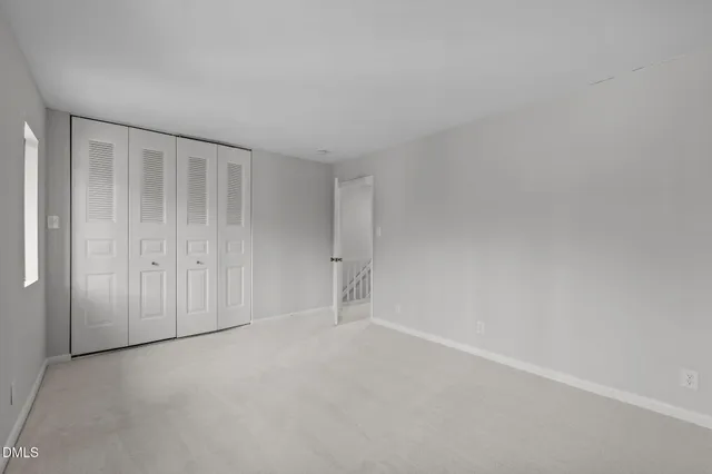 a bathroom with a sink a mirror and a toilet