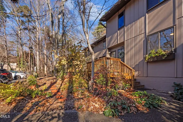 a house with trees in front of it