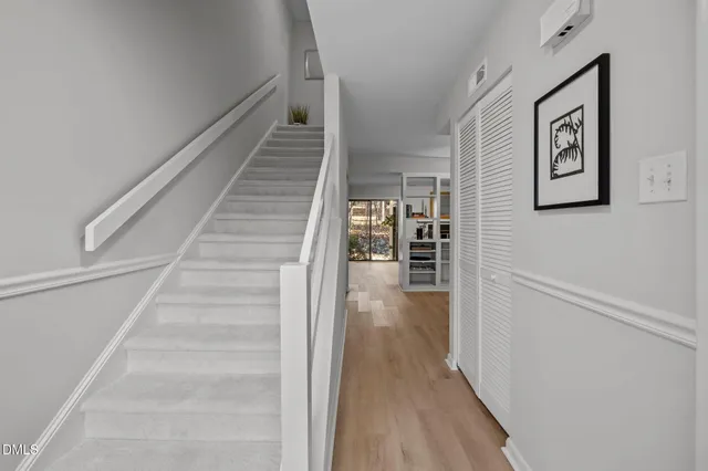 a view of a door and chair in a room