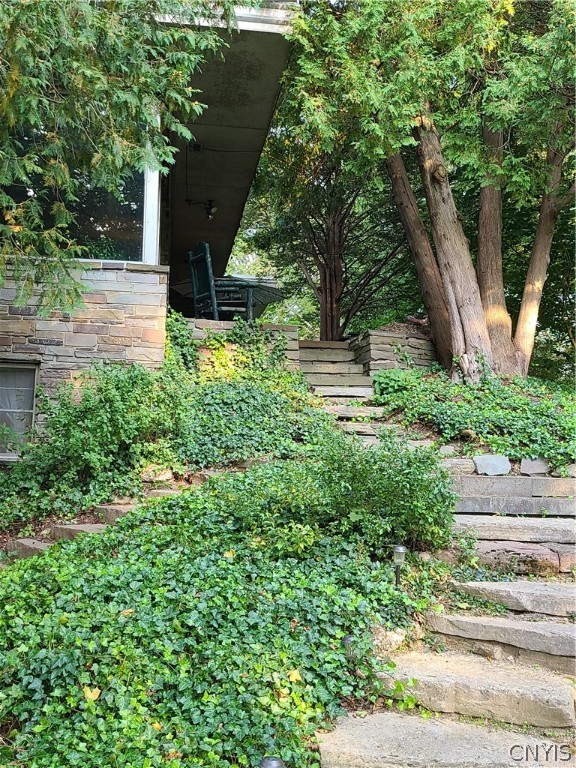 23 Sunset Terrace Lysander, NY 13027 - Photo 39 of 42 Stone path leading from patio to side yard