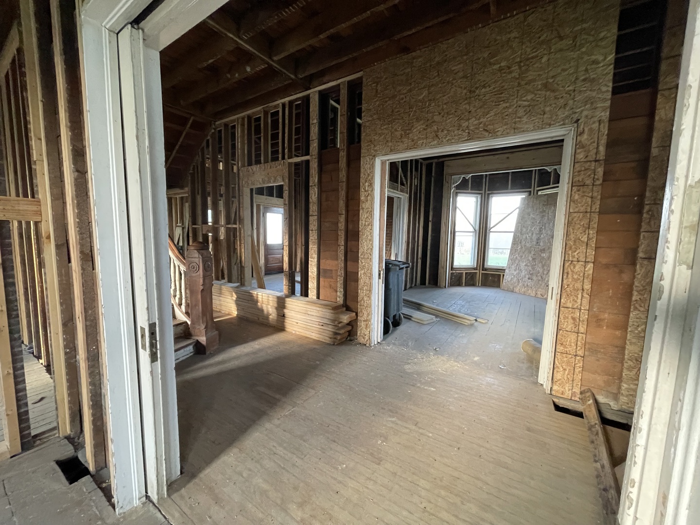 1707 Peru-Princeton Road Spring Valley, IL 61362 - Photo 8 of 29 a view of a hallway with wooden floor and windows