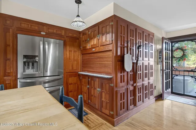 a view of hallway with windows