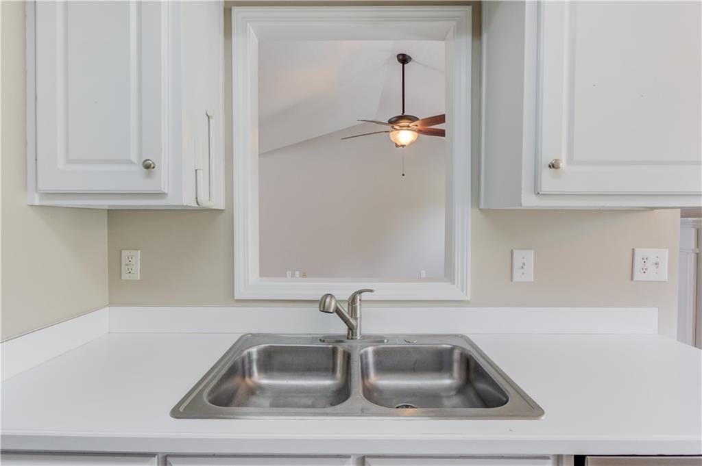 255 Turnberry Lane Winder, GA 30680 - Photo 16 of 41 a close view of sink and tap