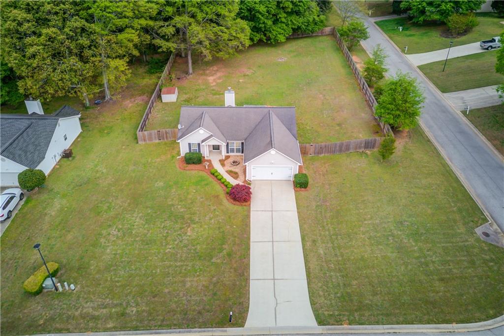 255 Turnberry Lane Winder, GA 30680 - Photo 2 of 41 a view of a swimming pool with a patio