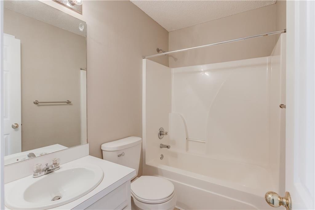 255 Turnberry Lane Winder, GA 30680 - Photo 26 of 41 a bathroom with a sink toilet and shower