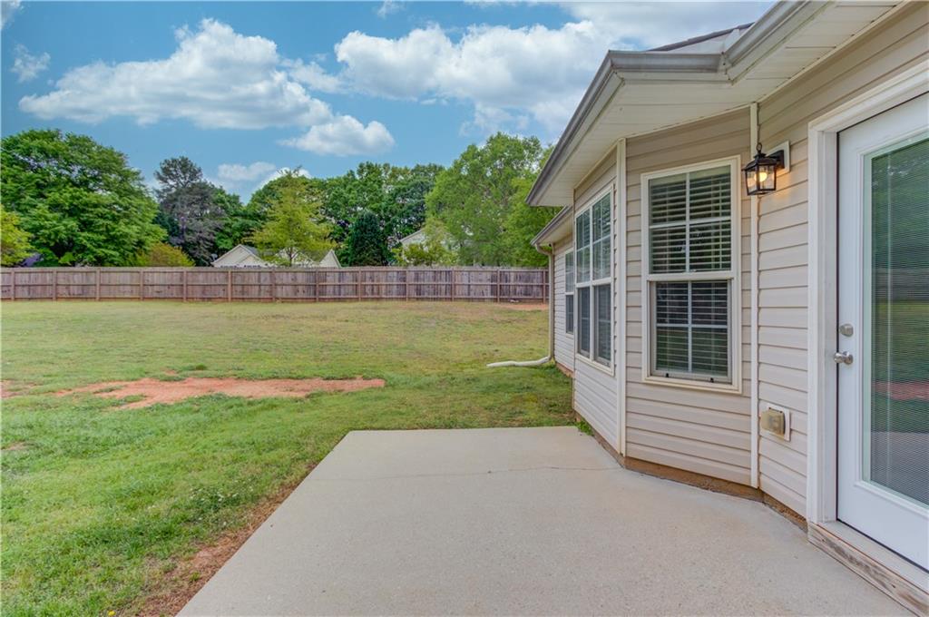 255 Turnberry Lane Winder, GA 30680 - Photo 32 of 41 a view of a house with a yard