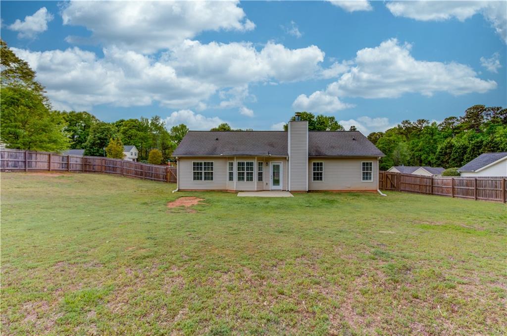 255 Turnberry Lane Winder, GA 30680 - Photo 34 of 41 a view of a house with a yard