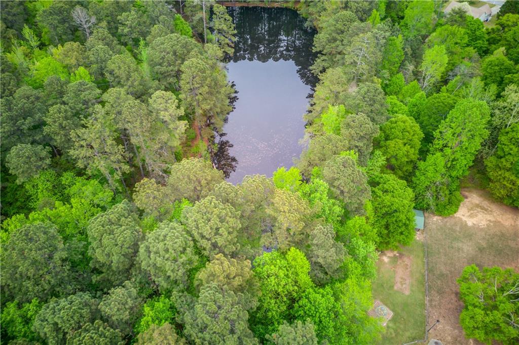 255 Turnberry Lane Winder, GA 30680 - Photo 39 of 41 an aerial view of residential house with outdoor space and trees all around