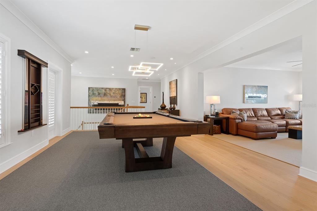 600 Putter Lane Longboat Key, FL 34228 - Photo 15 of 44 a living room with furniture a table and large windows