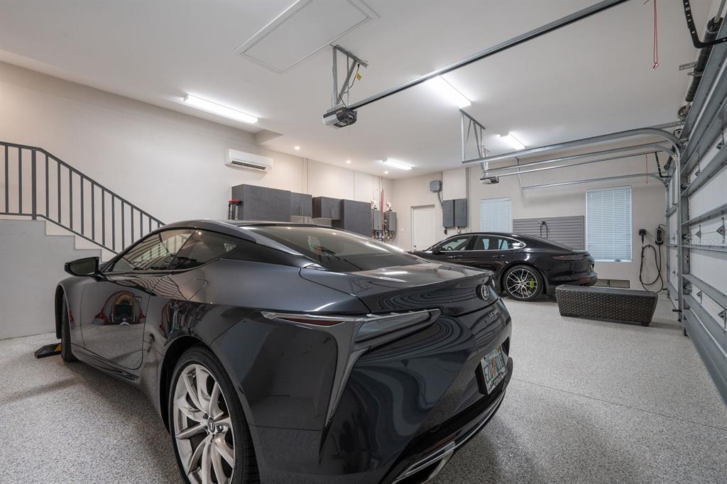 600 Putter Lane Longboat Key, FL 34228 - Photo 44 of 44 a car parked in a garage