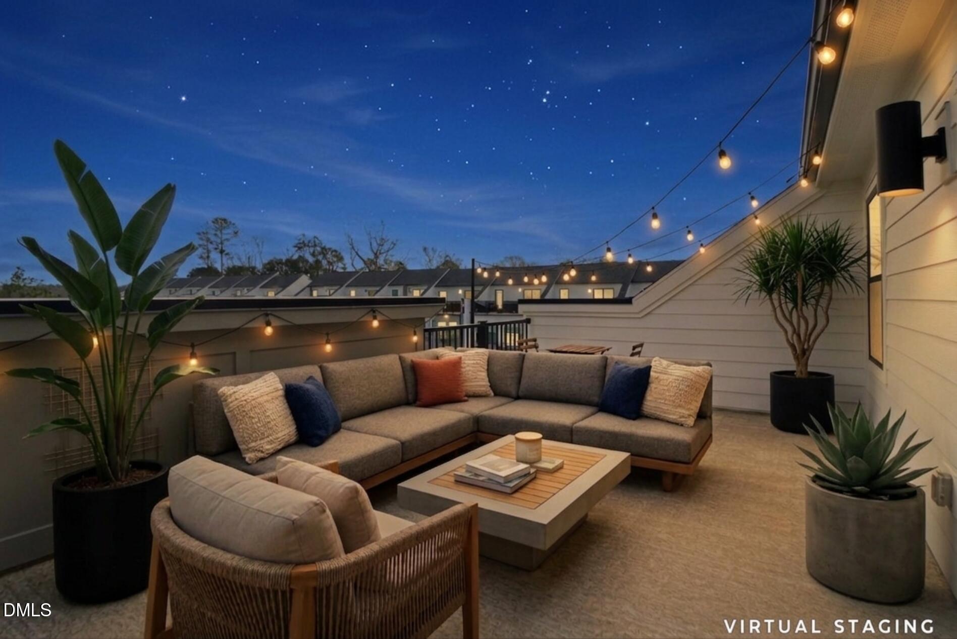 501 Hedrick Ridge Road Cary, NC 27519 - Photo 38 of 47 a roof deck with couch and a potted plant