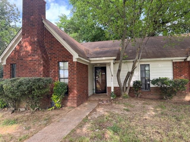 2670 Kate Bond Road Memphis, TN 38133 - Photo 12 of 13 a view of a house with a yard