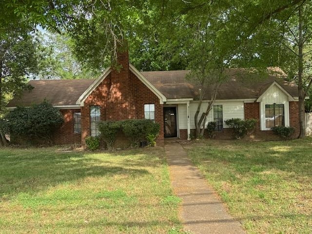 2670 Kate Bond Road Memphis, TN 38133 - Photo 3 of 13 a front view of a house with a yard
