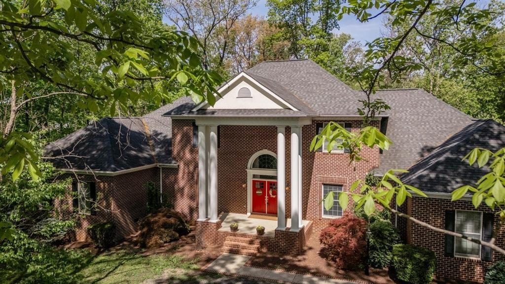 a house view with a garden space