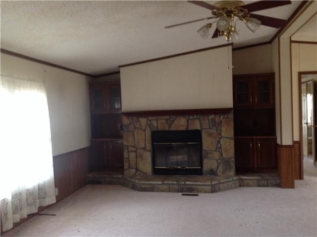 771 Jason Chapel Road Dickson, TN 37055 - Photo 6 of 17 Living room with impressive stone wood burning fireplace