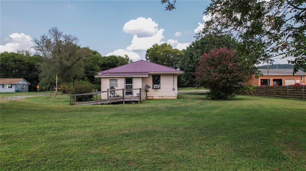 51 West Main Street Kingston, GA 30145 - Photo 12 of 15 a view of a house with a backyard