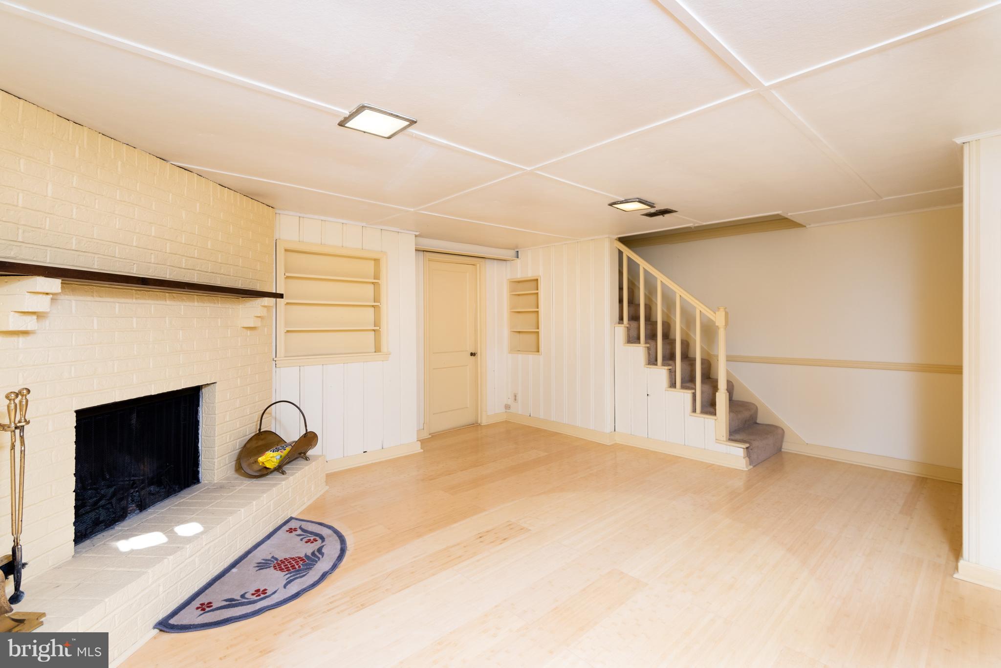 124 Overbrook Road Baltimore, MD 21212 - Photo 9 of 15 Lower lvl family room with fireplace