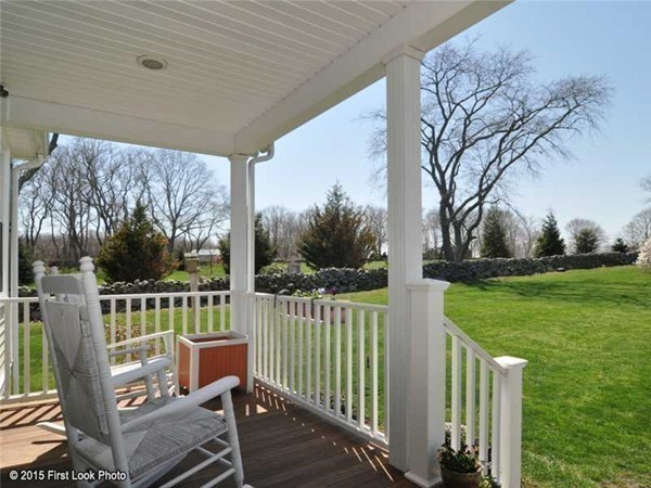 4196 Main Road Tiverton, RI 02878 - Photo 5 of 26 a view of a deck with mountain view and wooden floor