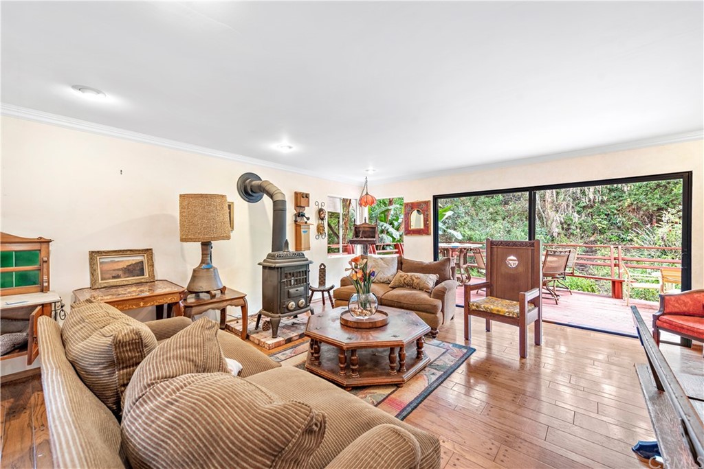 645 Griffith Way Laguna Beach, CA 92651 - Photo 24 of 55 a living room with furniture and a large window
