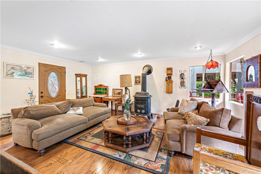645 Griffith Way Laguna Beach, CA 92651 - Photo 26 of 55 a living room with furniture kitchen view and large window