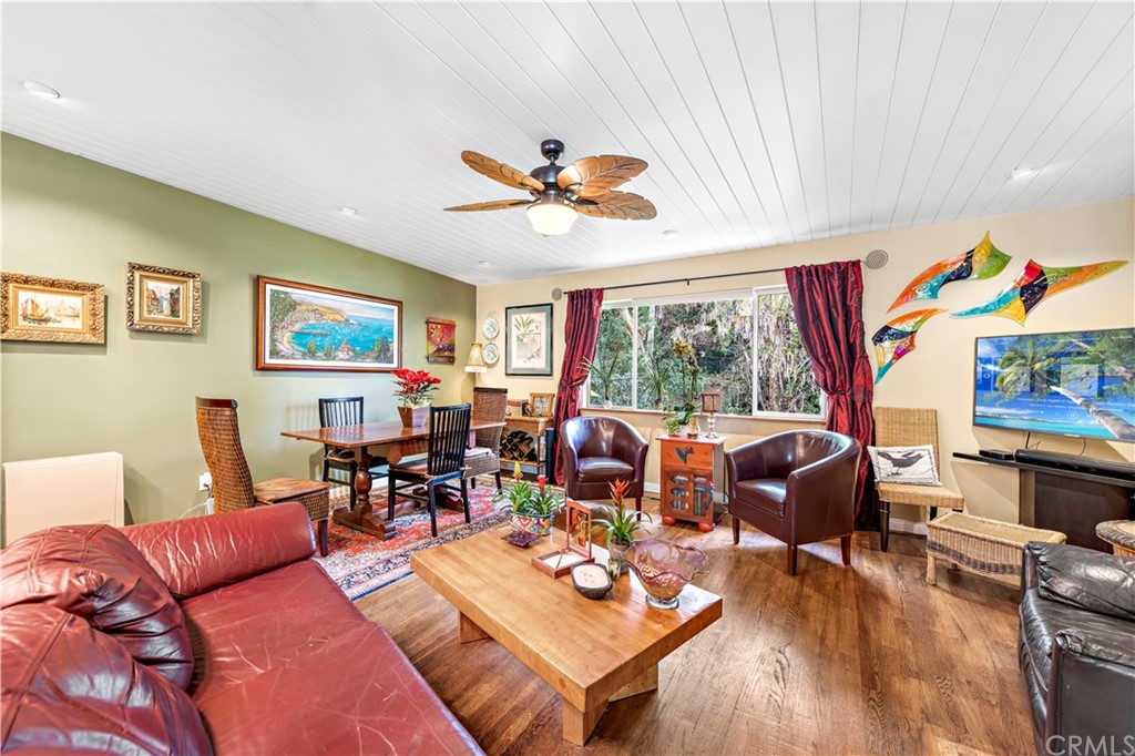 645 Griffith Way Laguna Beach, CA 92651 - Photo 9 of 55 a living room with fireplace furniture and a large window