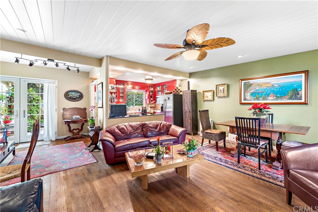 645 Griffith Way Laguna Beach, CA 92651 - Photo 10 of 55 a living room with furniture kitchen view and a chandelier