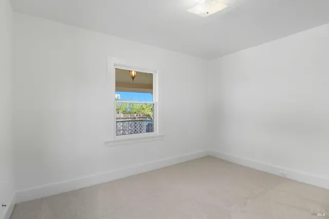 an empty room with a window