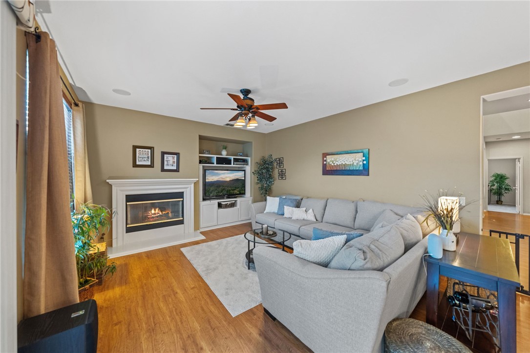 29248 Easton Place Temecula, CA 92591 - Photo 13 of 47 a living room with furniture and a fireplace