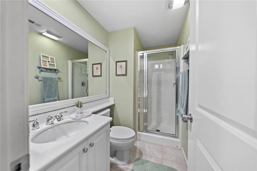 29248 Easton Place Temecula, CA 92591 - Photo 17 of 47 a bathroom with a sink toilet and shower