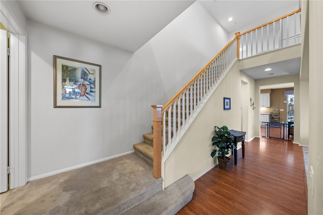 29248 Easton Place Temecula, CA 92591 - Photo 18 of 47 a view of entryway and hall with wooden floor