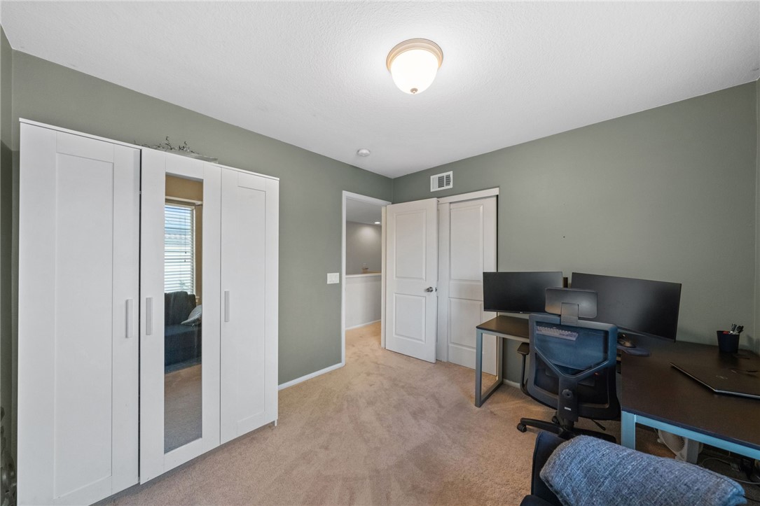 29248 Easton Place Temecula, CA 92591 - Photo 25 of 47 a view of a workspace with furniture and a window