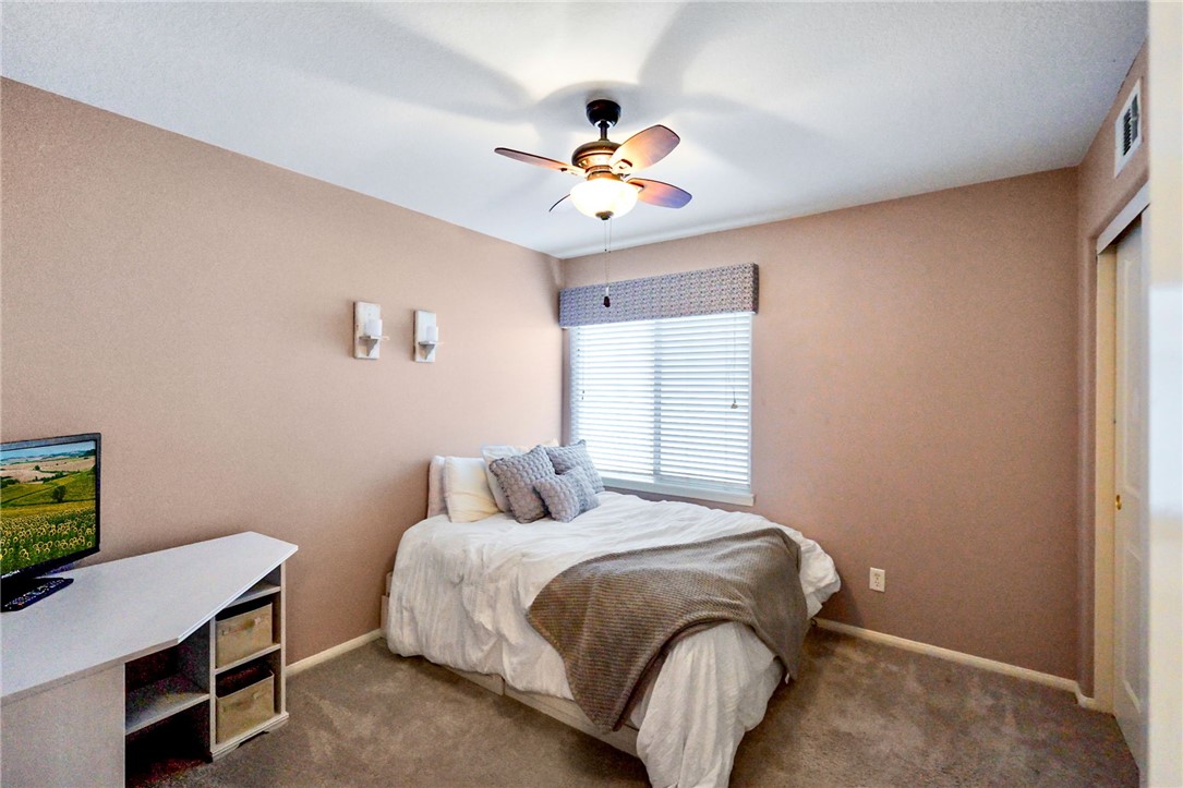 29248 Easton Place Temecula, CA 92591 - Photo 28 of 47 a bedroom with a bed and a window