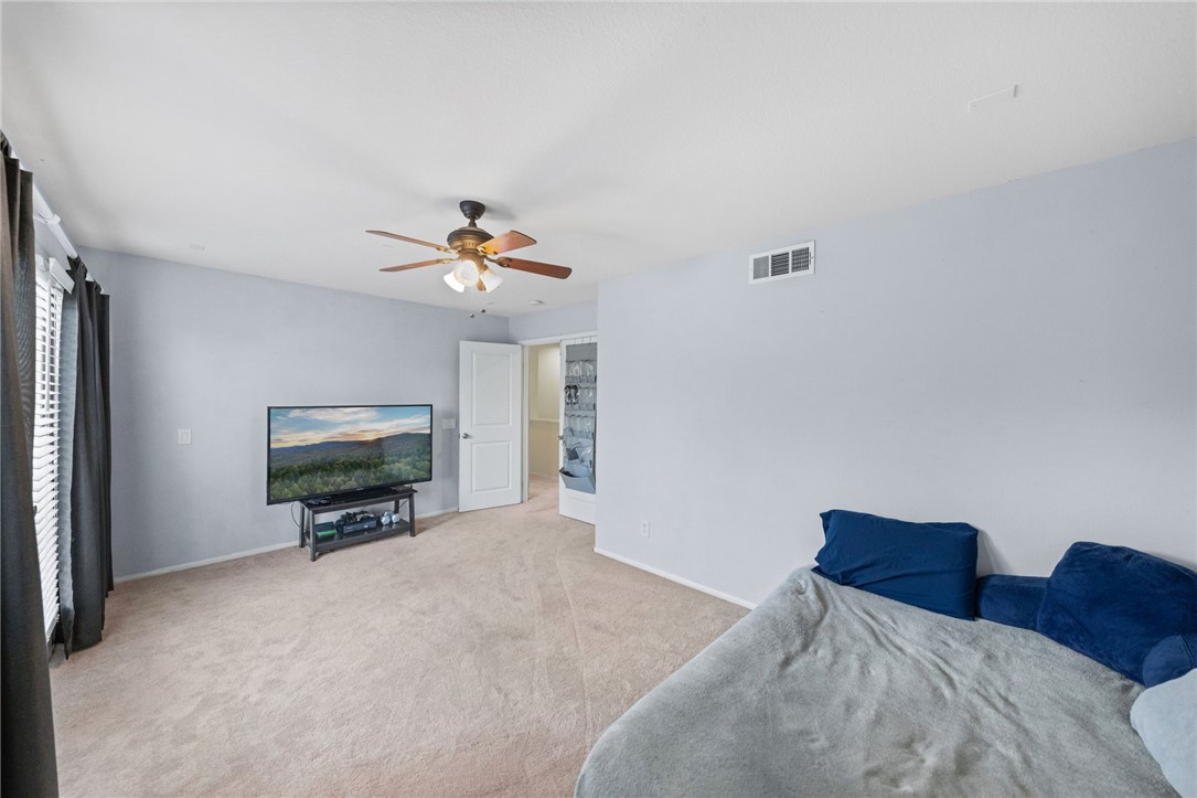 29248 Easton Place Temecula, CA 92591 - Photo 30 of 47 a bedroom with a bed and a television