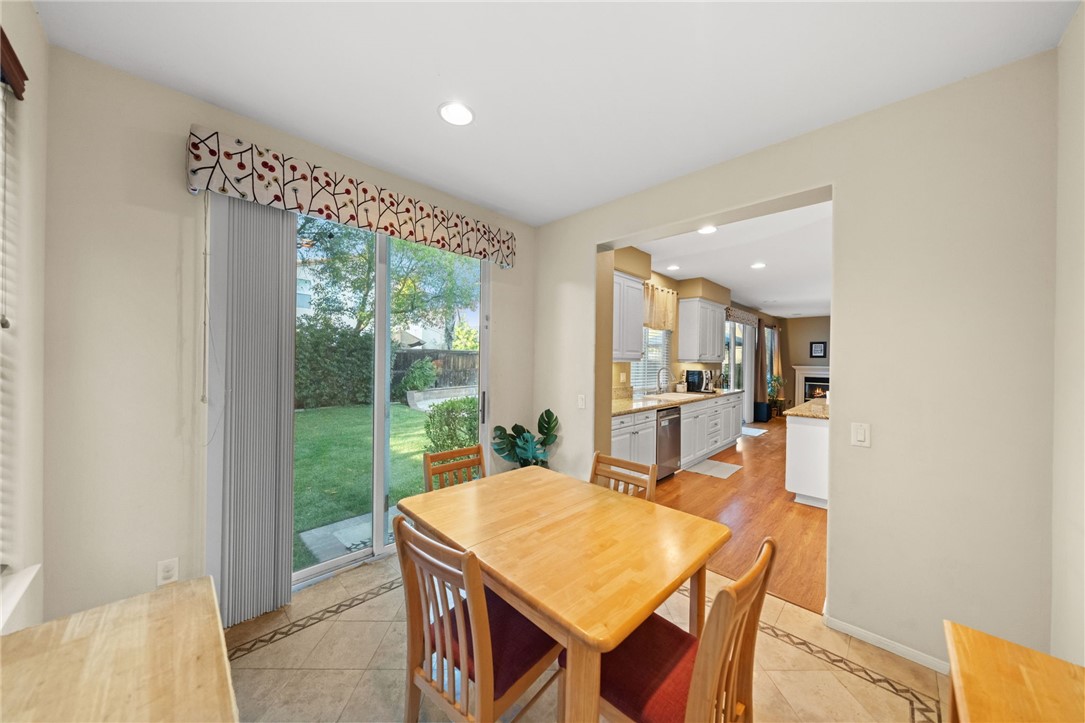 29248 Easton Place Temecula, CA 92591 - Photo 9 of 47 a dining room with a table and chairs