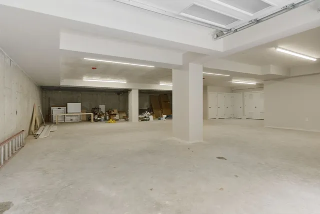 a view of a hallway with seating area