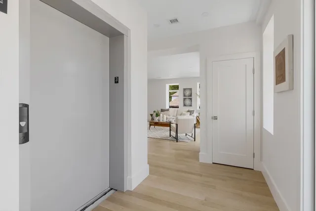 a view of a livingroom from a hallway