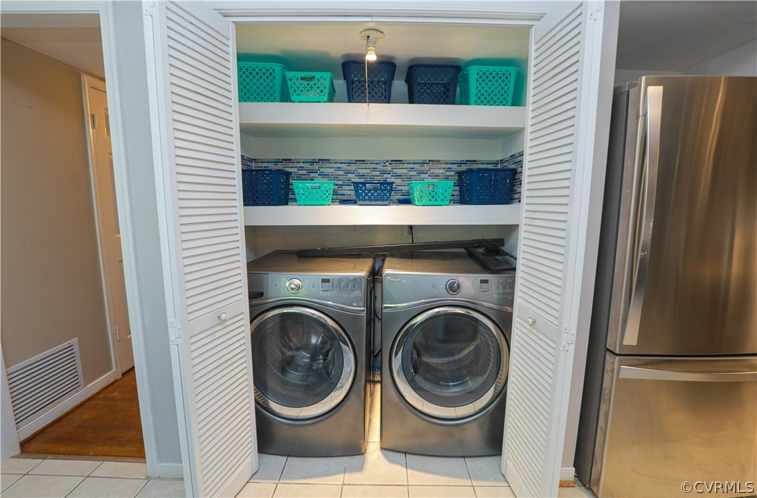 12935 Ashtree Road Midlothian, VA 23114 - Photo 20 of 50 a view of washer and dryer in a utility room