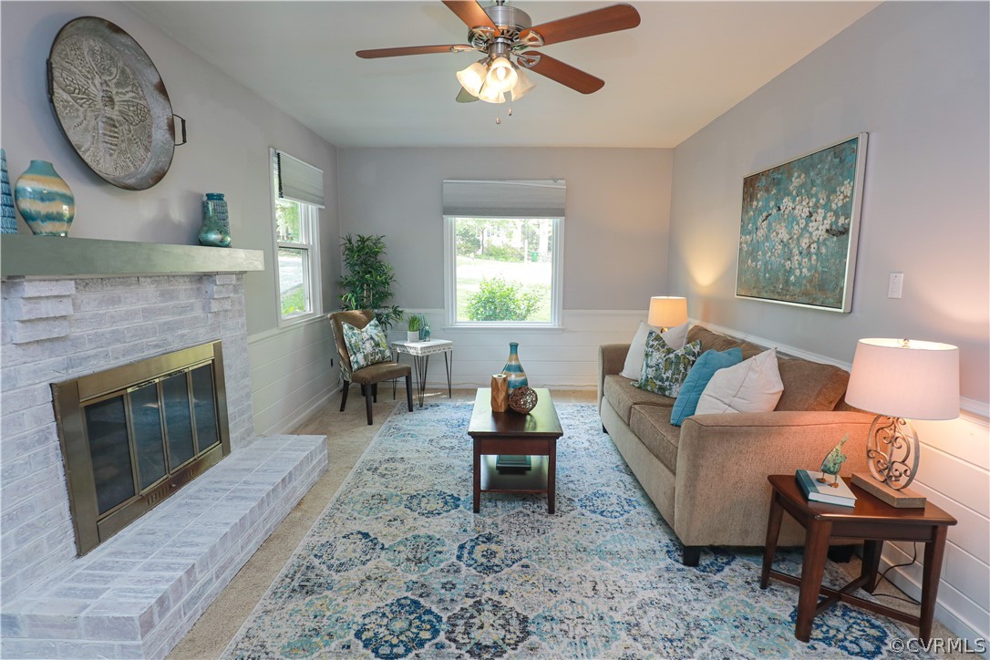 12935 Ashtree Road Midlothian, VA 23114 - Photo 21 of 50 a living room with furniture a window and a fireplace
